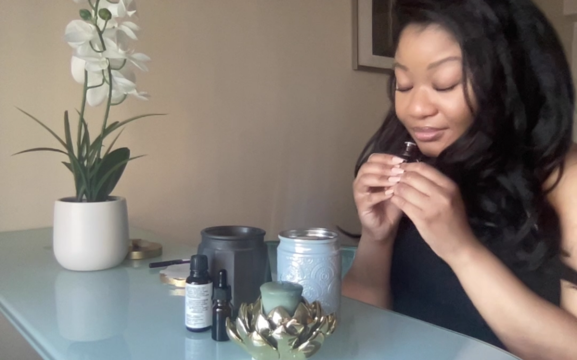 Ariel Powell smelling essential oils